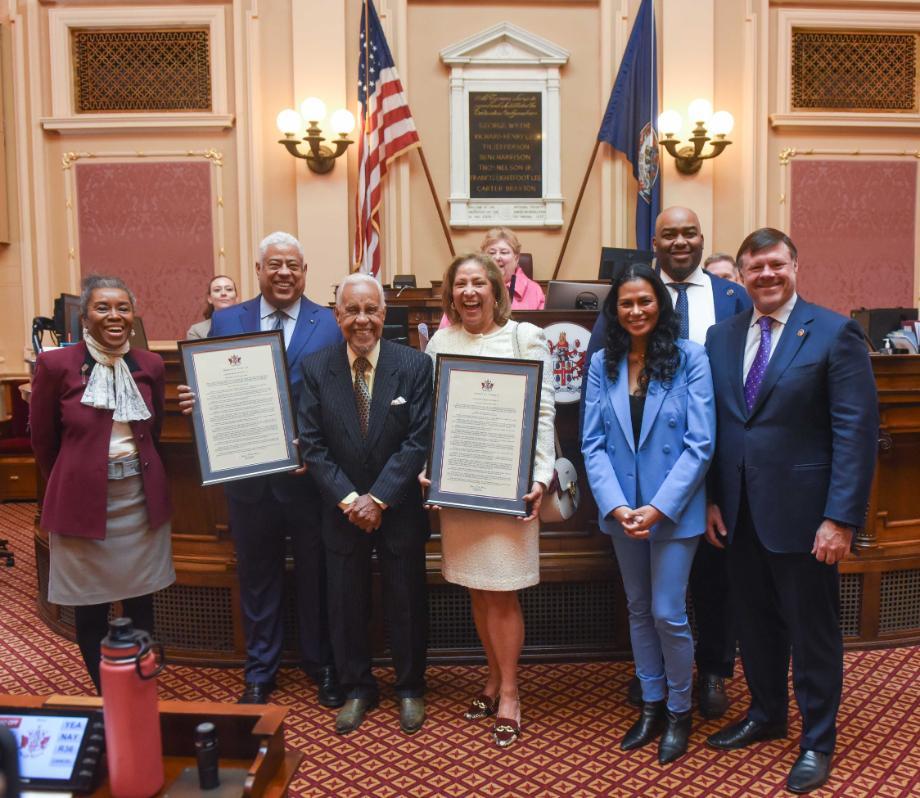 Governor Wilder is gathers with lawmakers during a center aisle ceremony in his honor.