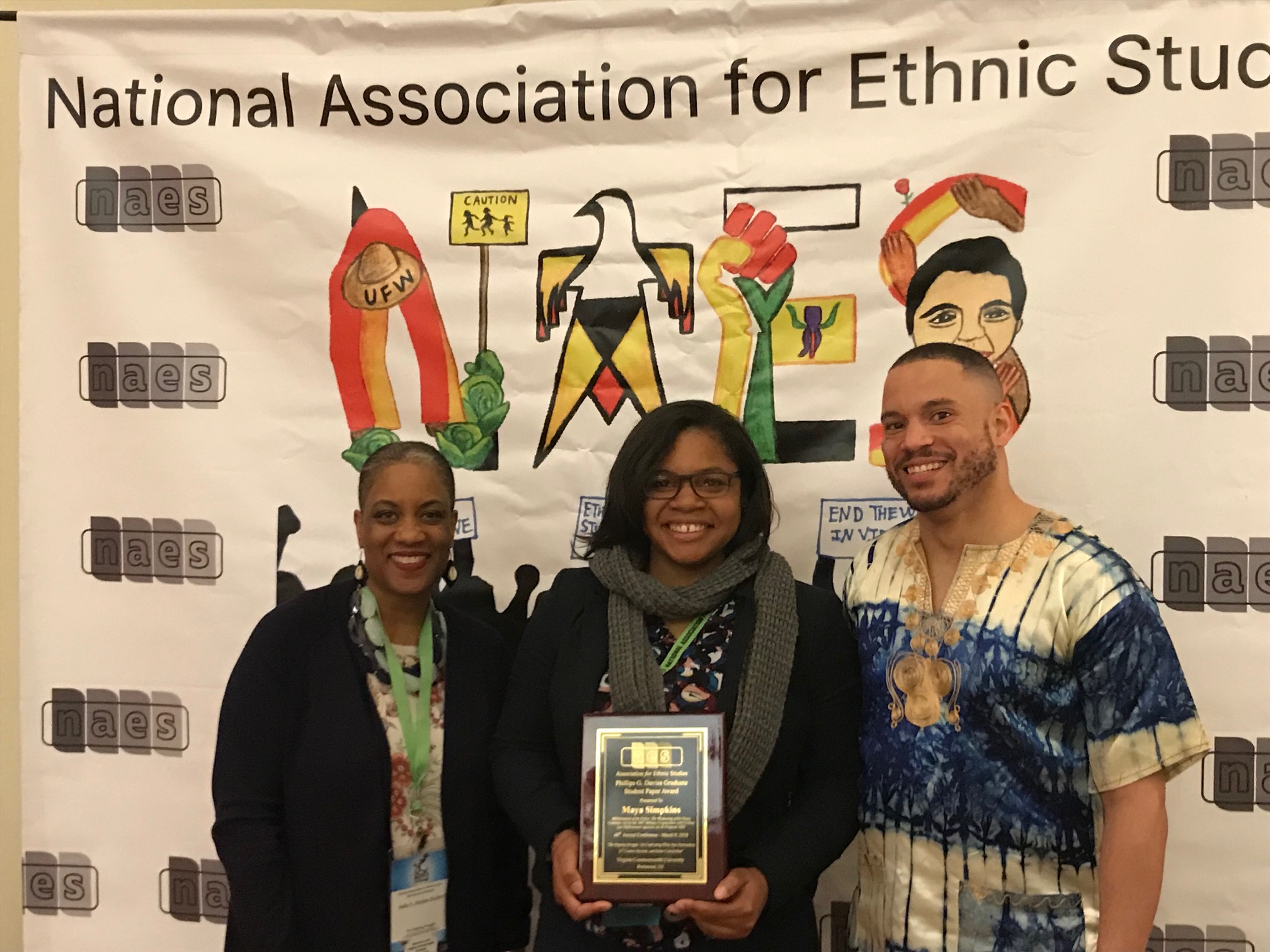 Wilder School M.P.A. Student Maya Simpkins (middle), who won the Phillips G. Davies Graduate Student Presentation Award at the 46th Annual Conference of the Association for Ethnic Studies, stands with Ravi Perry, Ph.D. (right), chair of the VCU Political Science Department and conference chair, and Julia Jordan-Zachery, president of AES.