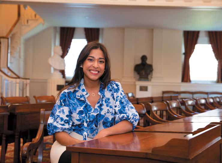 A headshot of Sofhia Pineda Garay in the virginia capitol building