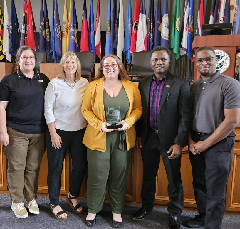 HSEP students and faculty pose at conference