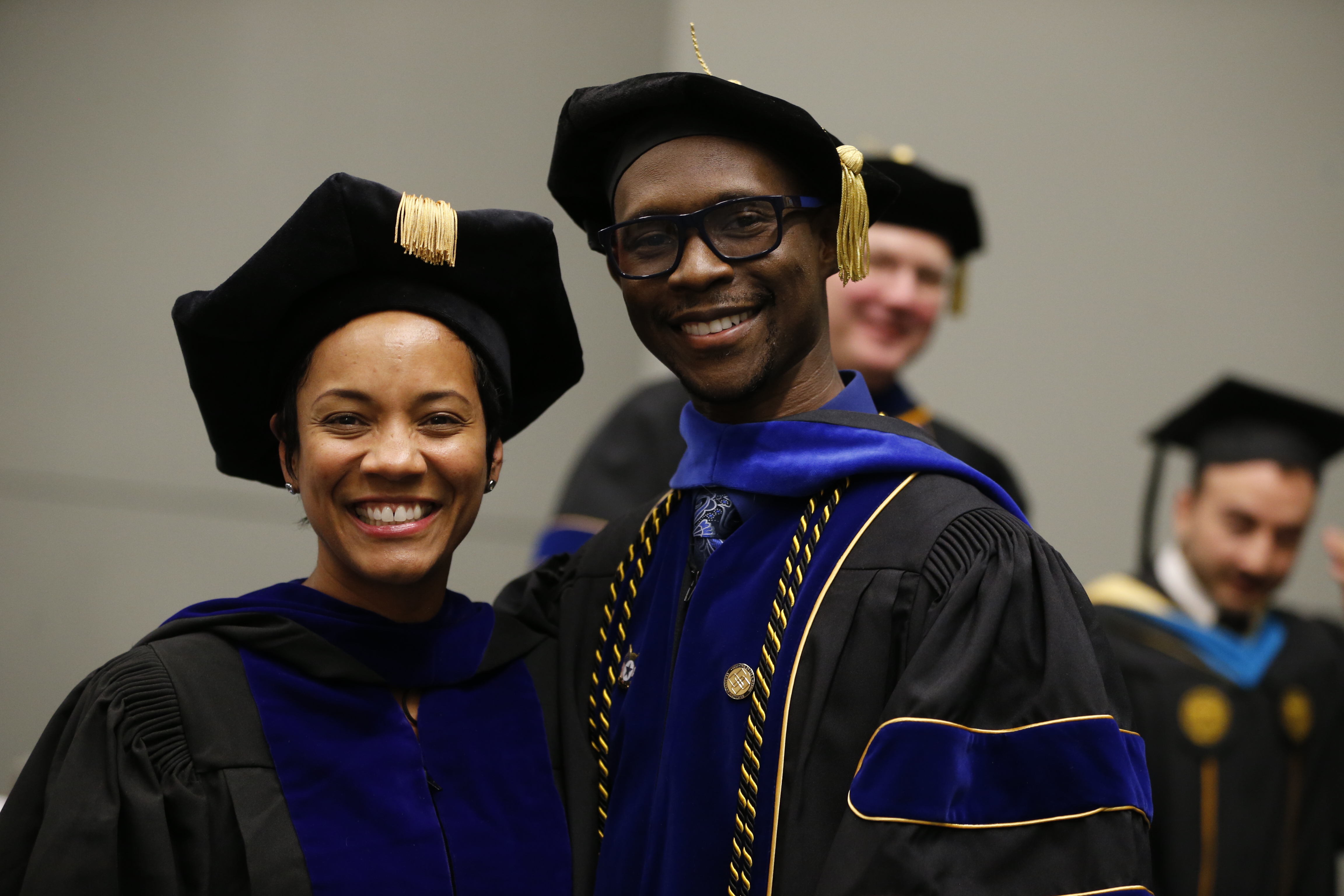 Diversity, Equity and Inclusion Committee members Shajuana Isom-Payne and Chernoh Wurie, Ph.D., pose for a photo at the Wilder School's graduation ceremony on May 12, 2018.